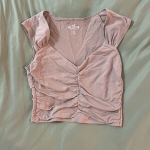 Light beige ruched cap sleeve shirt